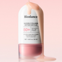Biodance Sun Fluid – flasken med teksturen løbende ned ad siden